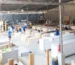 Retail display manufacturing process in factory workshop woodworking workers