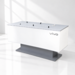 Vivo LED retail display desk with illuminated front panel on white background
